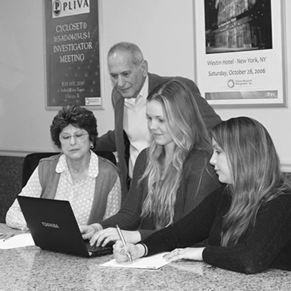 CRMG clinical research professionals collaborating in a meeting