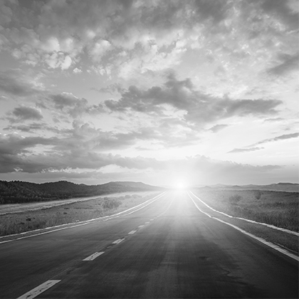 Open road toward the horizon representing CRMG vision and direction